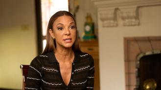 Eva LaRue being interviewed in her home