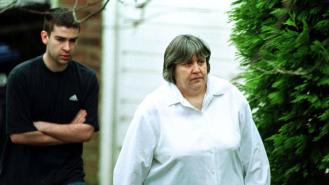 Primrose Shipman outside her house with her son David