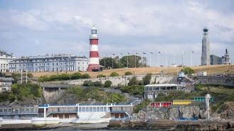Plymouth Hoe with lighthouse, war memorial, Georgian architecture, bathing huts and Art Deco lido.