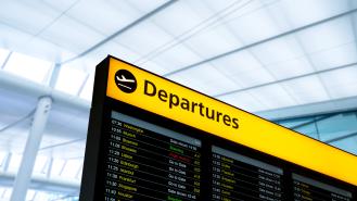 The departures board at an airport