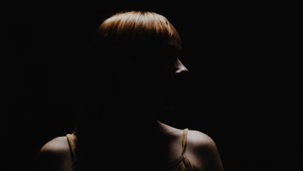 A woman in silhouette