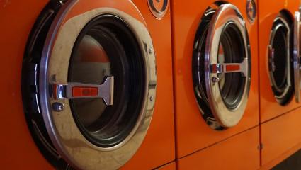 A row of washing machines in a launderette