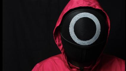 Guard from Squid Game on black background.