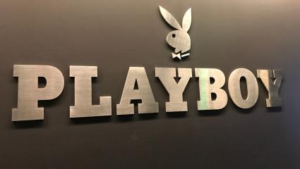 Playboy bunny and logo on a wall by the company's headquarters