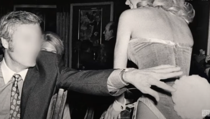 An unidentified man attempts to grab for a Playboy Bunny