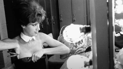 An old image of Gayla Guenot getting ready backstage at a Playboy club
