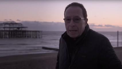 Peter James in front of the old Brighton pier 