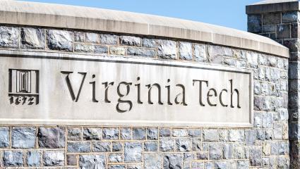 Virginia Tech sign on a wall outside campus