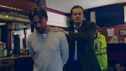 Stephen French being arrested