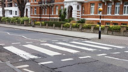 A stock photograph of Abbey Road crossing in London, UK, made famous by The Beatles.