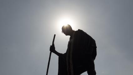 A photograph of a Mahatma Gandhi statue.