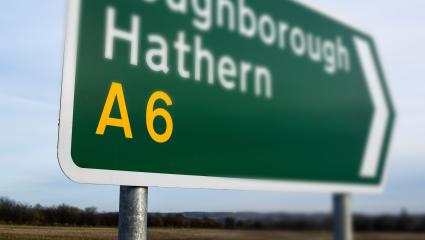 A photograph of a UK road sign for the A6 road