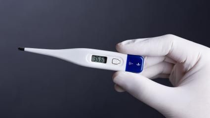 A stock photograph of a doctors digital thermometer.