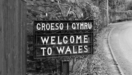 A photograph showing a 'Welcome to Wales' sign