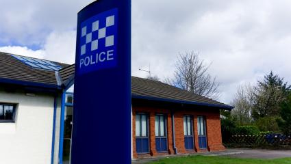 A stock photo of a modern Scottish police station.