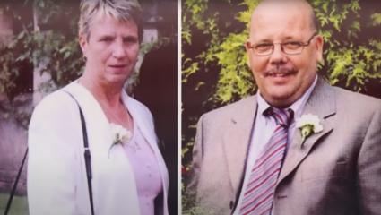 Joan and John Stirland posing at a wedding