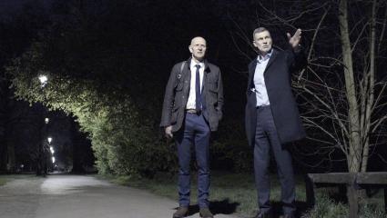 Graham Hill and Nick Scola in a park at nighttime