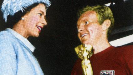 Queen Elizabeth II presenting the World Cup trophy to Bobby Moore