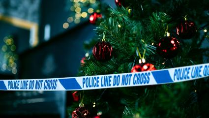 A Christmas tree with police tape 