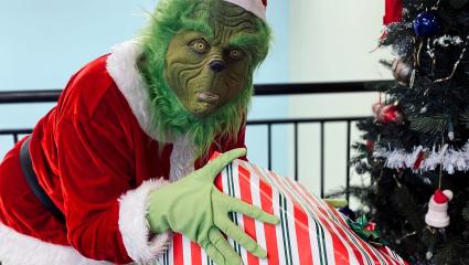 The Grinch stealing a Christmas present