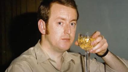 Russell Causley drinking wine