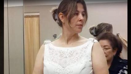 Laura Grillo trying on a wedding dress