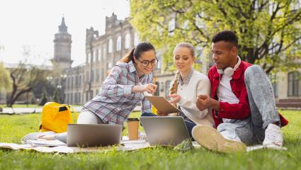 University students sitting outside