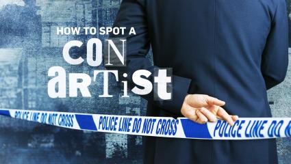 A person crossing their fingers behind police tape