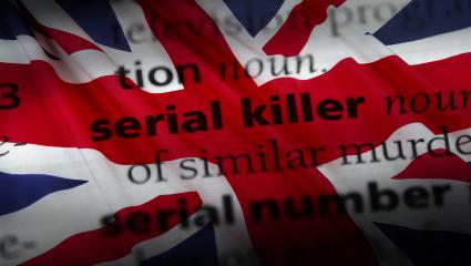 A photograph of the dictionary entry for 'Serial Killer' with the Union Flag in the background