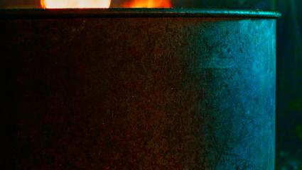 Close up of an oil barrel on fire