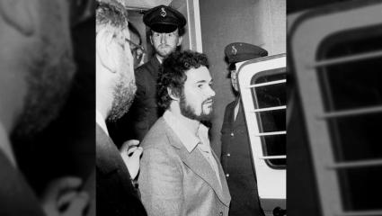 Peter Sutcliffe being escourted by police