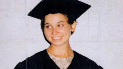 Lynsie Ekelund in her graduation gown