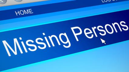A cursor hovering over a 'Missing Persons' banner on a web page