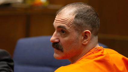 Michael Gargiulo wearing an orange jumpsuit during a court hearing