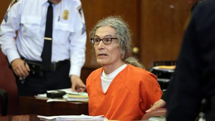 Rodney Alcala wears an orange jumpsuit during a court appearance