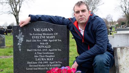 Laura May Al-Shatanawi's son, Rasheed Vaughan, with her gravestone that she shares with her parents