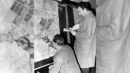 Inspectors make marks on a map while investigating the murder of Katherine Lillian Armstrong