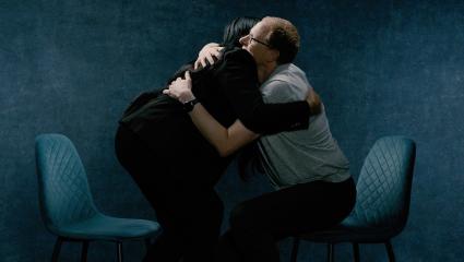Rob Parkes hugs Nina Aouilk