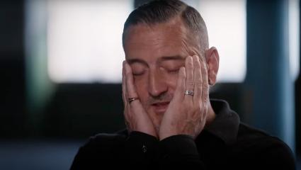 Will Mellor with his head in his hands