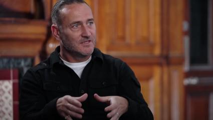 Will Mellor making a strangling gesture with his hands
