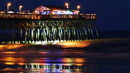 A pier in Myrtle Beach, South Carolina at night
