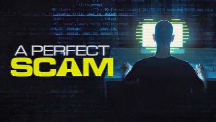 'A PERFECT SCAM' - A hacker sitting in front of a desktop computer with lots of code written everywhere