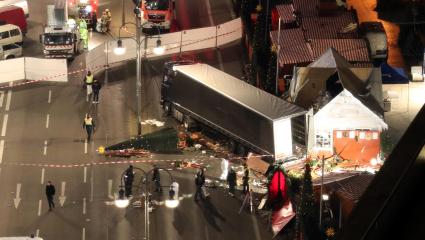 Police set up a cordon after a heavy goods vehicle drove through a Berlin Christmas market