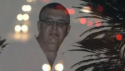 Photograph of Ian Walters, who deliberately crashed his car to kill his wife Tracy. In the photo, he is seen looking at the camera and grimacing. 