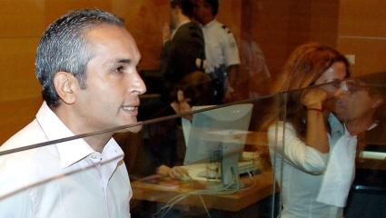 Suspect Mohammed M'Barek and his sister Jamila stand at the start of his trial in a Nice courthouse