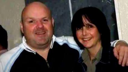 Clifford Mills with his arm around Lorna Smith