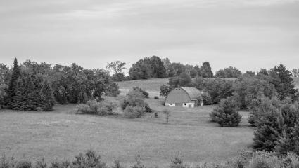 Black and white photograph of rural farmland in Wisconsin