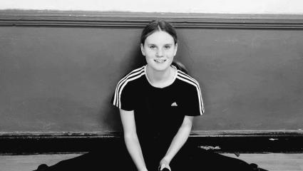 A black and white photo of Holly Newton