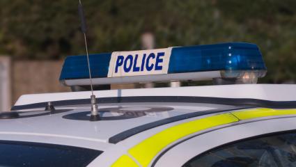 Blue lights on top of a police car