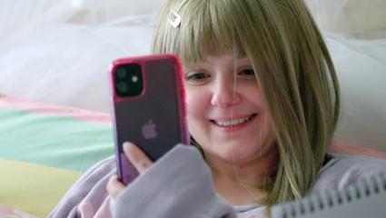 Ariel Winter dressed as a 12-year-old using her phone for a video call in a predator sting